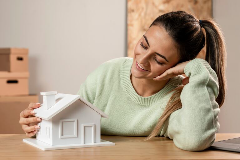 Comprar una casa.